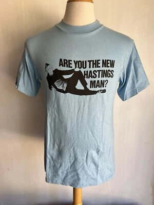 ¿ERES EL NUEVO HOMBRE HASTINGS? Camiseta Oficial Vintage Años 70 Yunque Talla Mediana Foto 1 de 4
