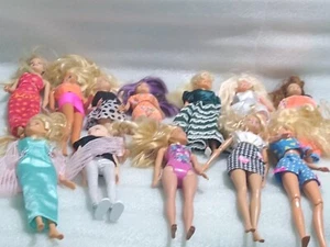 Konvolut 12 Barbie Puppen - Bild 1 von 9