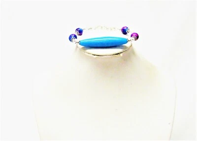 Pulsera larga ovalada azul con cuentas de vidrio multicolor  Foto 1 de 4