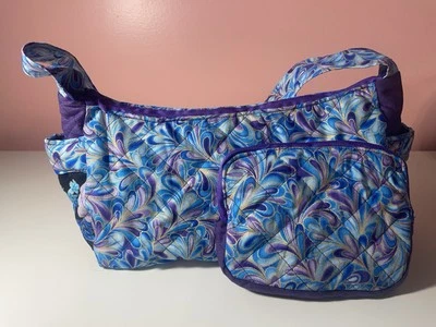 Cartera acolchada hecha a mano única en su clase Foto 1 de 4