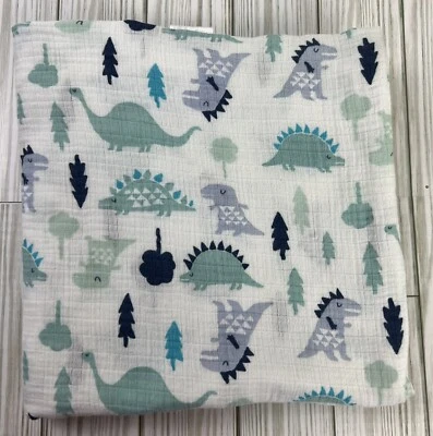Manta bebé ADEN + ANAIS algodón muselina envoltura Lovey Dinosaurios azul verde Foto 1 de 4