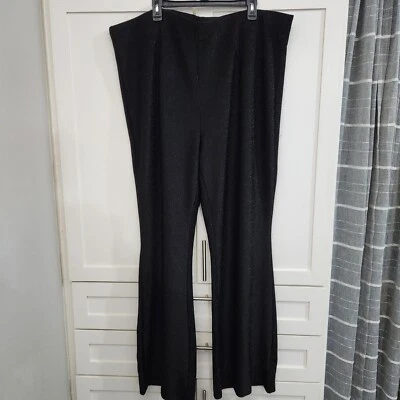 Pantalones acampanados Torrid 4X negros brillantes elásticos Hollywood Indie Sleaze Whimsigoth Foto 1 de 4