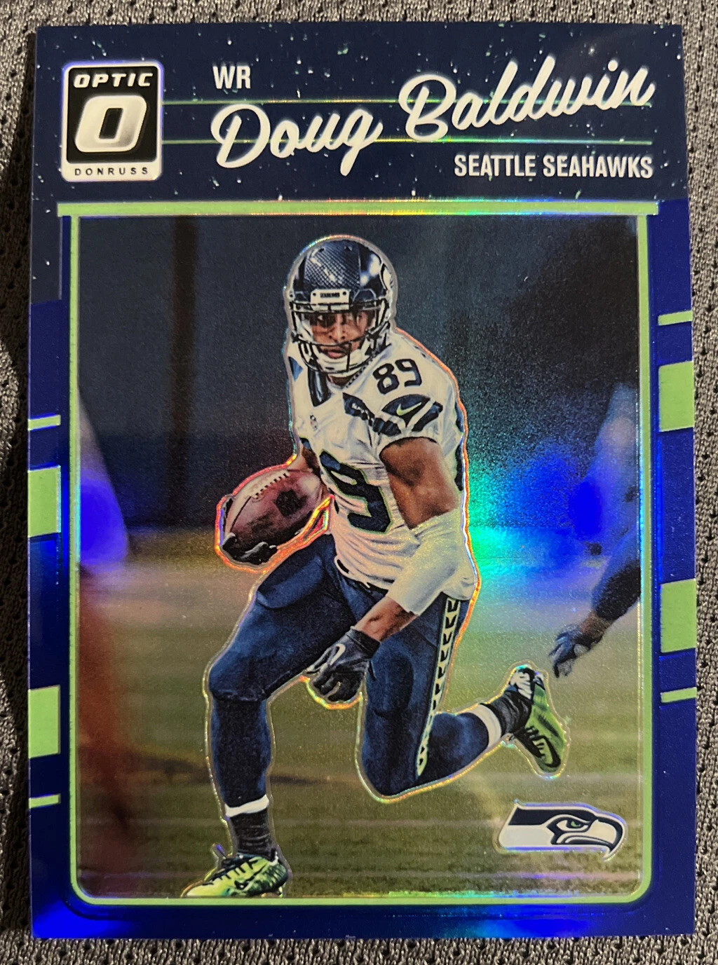 2016 Panini Donruss Optic Blue #’d /149 Doug Baldwin No. 91