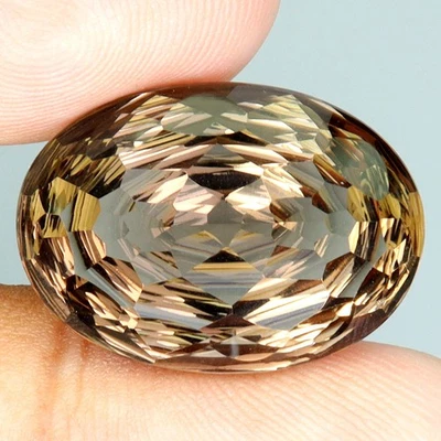 Cuarzo ahumado limpio natural corte cóncavo ovalado Brasil 19,60 quilates 22x15,5 mm piedra preciosa Foto 1 de 4