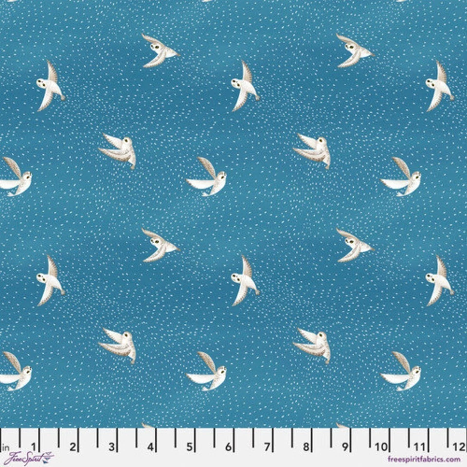Free Spirit Woodland Holiday Flying Snowy Owls on Blue Fabric  1 yard - Image 1 of 1