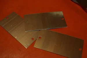 One new 1.5" x 3.0" x .015 Titanium tag with two 5/32 holes. - Picture 1 of 1