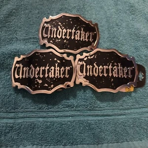 1 As-Is Licensed Wrestling The Undertaker Black Enameled METAL Belt Buckle WWF - Picture 1 of 2