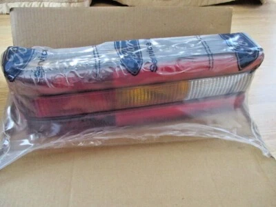 Conjunto de luces traseras traseras negras Ford Escort LH 1985-1988 NUEVO OEM E6FZ-13405-A Foto 1 de 4