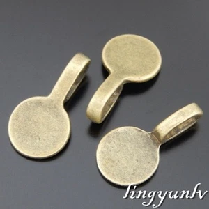 40 conectores colgantes de almohadilla plana redonda de aleación de bronce retro 17*9 mm - Imagen 1 de 2