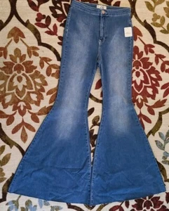 NWT We The Free Free People Flare Jeans Medium Wash 28 $78 - Picture 1 of 6