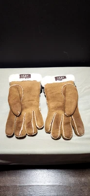 Guantes de gamuza tostados y marrones talla grande en buen estado. Con lazo de cuero.  Foto 1 de 4