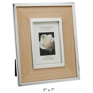 El hermoso marco de fotos plateado con inserciones de madera XL - Imagen 1 de 1