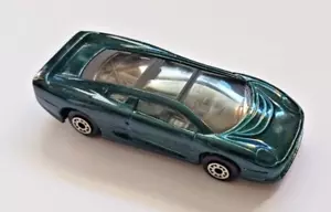 Maisto Jaguar XJ220 Die Cast escala 1:64 RARO verde bosque, recién fuera de paquete - Imagen 1 de 3