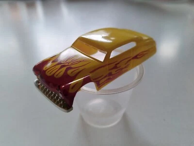 CUERPO DE TRINEO LED DE PLOMO TABLERO MERCURY AMARILLO CON LLAMAS ROJAS SE ADAPTA AL CHASIS TJET NUEVO CON DEFECTOS Foto 1 de 4