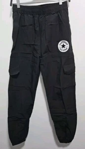 Pantalones deportivos Converse All Star Chuck Taylor cortavientos M negros  - Imagen 1 de 7