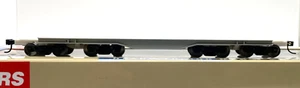 HO WALTHERS 932-5640 GOLD LINE 66' HEAVY DUTY 4 TRUCK FLAT CAR UNDECORATED - Picture 1 of 2