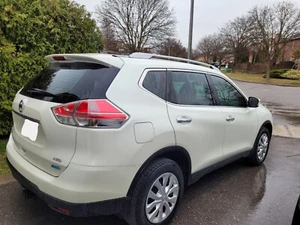 2015 White Nissan Rogue S AWD - Picture 1 of 3