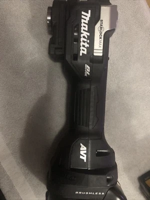 Makita XMT04 18v Multi -cutter / 5.0 AH - Image 1 of 4