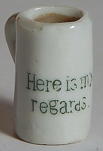TAZA ANTIGUA DE PIEDRA DE PORCELANA EN MINIATURA ""HERE IS MY REGARDS - Imagen 1 de 5
