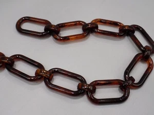1 MT CATENA CATENE POLIESTERE TARTARUGATA MARRONE OVALE PER BORSE CINTURE BIGIOT - Picture 1 of 1
