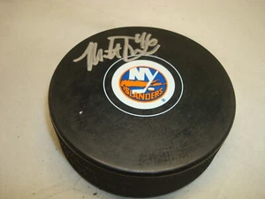 Disco de hockey firmado por Matt Donovan de los New York Islanders autografiado 1A - Imagen 1 de 2