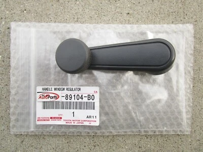 84-99 TOYOTA 4RUNNER PUERTA DELANTERA DERECHA VENTANA MANIVELA GRIS OEM NUEVO Foto 1 de 3