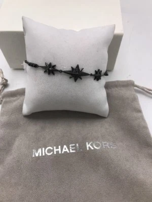 $115 MICHEL KORS BLACK ION PLATED STARBURST PAVE SLIDER BRACELET M3 - Image 1 of 4