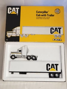 ERTL CATERPILLAR TRACTOR TRAILER NEW IN BOX - #7712 - 1:64 SCALE DIE CAST CAT - Picture 1 of 4