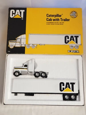 ERTL CATERPILLAR TRACTOR TRAILER NEW IN BOX - #7712 - 1:64 SCALE DIE CAST CAT - Image 1 of 4