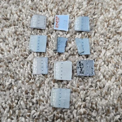 Lote de 10 pestañas vintage de plata para reparación de chatarra Levis jean EE. UU. 501 505 517  Foto 1 de 4