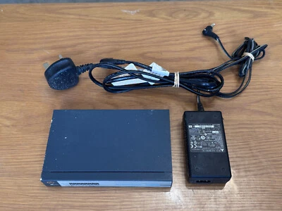 HP 1410-8G Switch with PSU ( HP 8-Port Gigabit Network Switch)  - Image 1 of 4