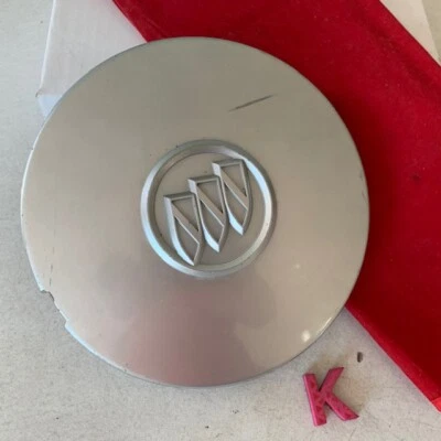 #K 1) 2004 - 2005 Buick LeSabre Century OEM Silver Wheel Center Cap 9594285 - Image 1 of 4