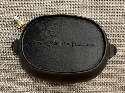 Horno holandés Snow Peak Kolo holandés ovalado de hierro fundido usado Foto 1 de 4