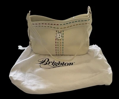 Cartera de cuero blanco Brighton con detalles de puntada multicolor y herrajes plateados Foto 1 de 4