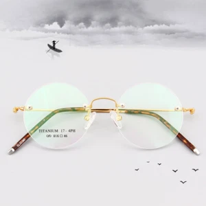 Montures de lunettes rondes sans monture rétro légères métal Temple Glasses unisexe - Photo 1/19