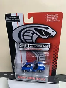 Shelby Collectibles Cobra 427 S/C Roadster Blue/White Stripes 1:64 Detailed NIP - Picture 1 of 15