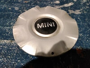 2004 - 2009 Mini Cooper Silver OEM Center Cap P/N  3613 6764100-01  - Picture 1 of 4