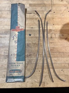 NOS GM 987565 1957 Chevrolet 4 Door Sedan Belair 210 150 Door Edge Guards Sedan - Picture 1 of 6