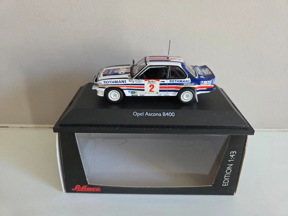 Schuco 1/43 Opel Ascona B400 Harryman/Vatanen - #2 Safari Rally 1983 - 05522 - Immagine 1 di 4