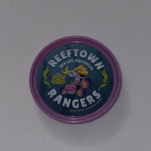 SEA LIFE Aquarium Reeftown Rangers Mission Success Pop Badge Button Jr. Purple - Picture 1 of 12