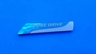 NISSAN ALTIMA SENTRA VERSA JUKE MURANO ROGUE PURE DRIVE EMBLEMA LOGOTIPO INSIGNIA B12 Foto 1 de 3