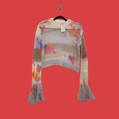 Nuevo con etiquetas Suéter corto Free People manga campana envejecida floral $228 XS Top  Foto 1 de 4