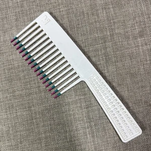Peine de volumen blanco dos veces sumergido Mebco vintage años 80 verde azulado ciruela (d) - Imagen 1 de 7