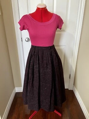 Falda plisada de lana vintage años 50 marrón manchada (rojo, amarillo, azul, rosa). Foto 1 de 4