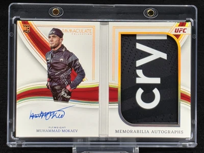 Folleto de recuerdos Immaculate UFC 2023 #d/8 Muhammad Mokaev novato radiocontrol automático dorado Foto 1 de 4