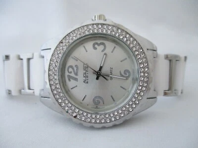 Reloj August Steiner para mujer de cerámica genuina 1 ATM resistente al agua diamantes de imitación Foto 1 de 4