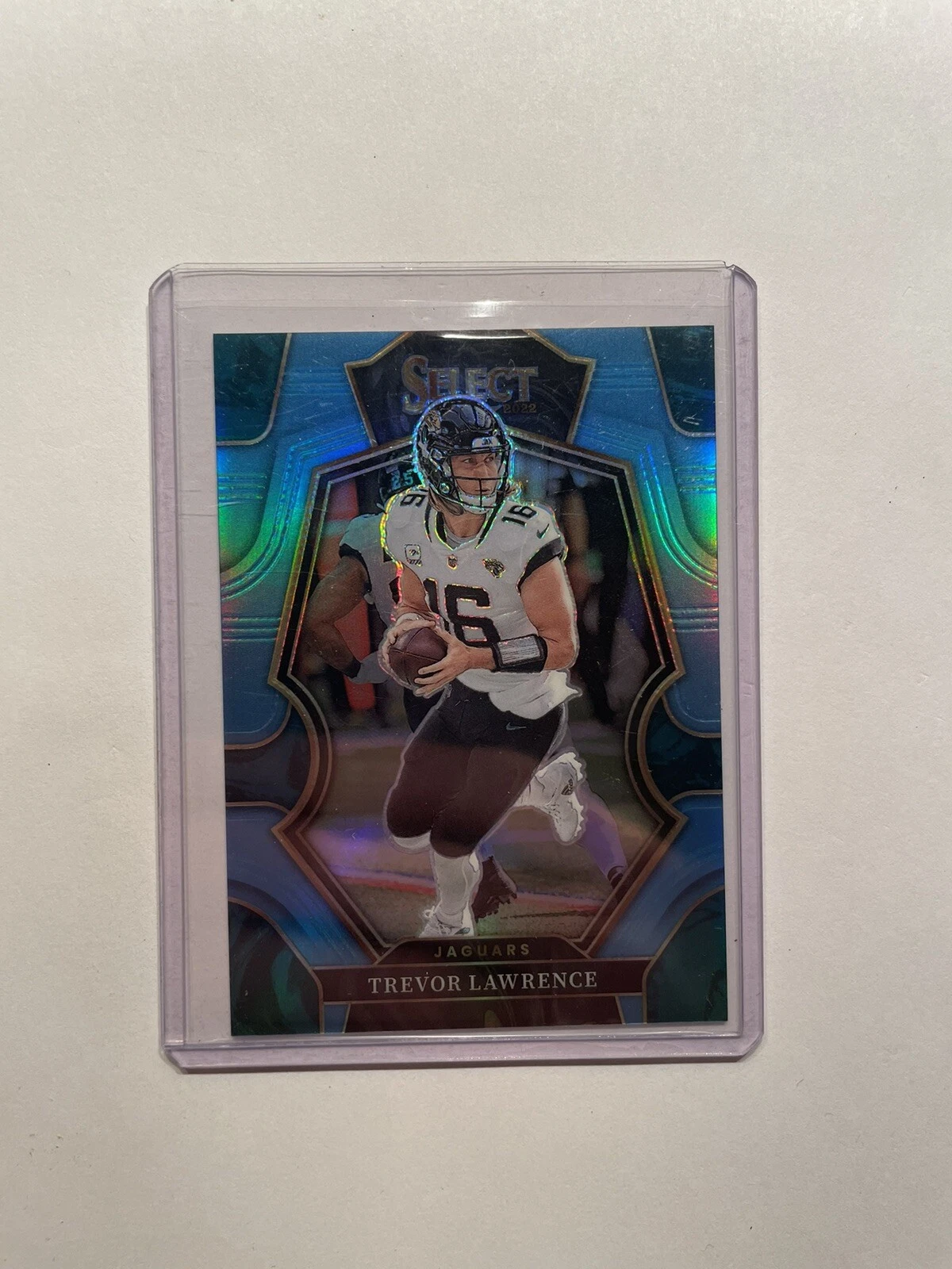 2022 Select Trevor Lawrence #145 Light Blue Prizm #16/99 (Jersey #)