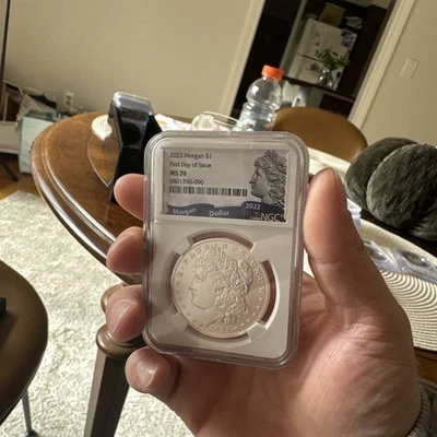 2023 Morgan Silver Dollar $1 First Day of Issue FDOI NGC MS 70 - Image 1 of 2