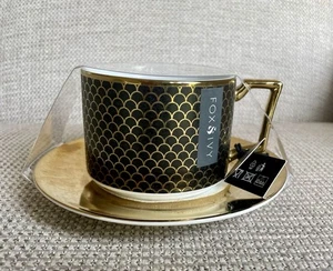Taza y platillo Fox & Ivy para Tesco en diseño Soho dorado/negro - Imagen 1 de 7