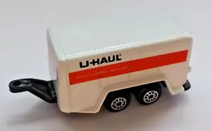 Remolque de 4 ruedas U-Haul escala 1:64 ~ 3" pulgadas de largo, Maisto, nuevo estado suelto - Imagen 1 de 5